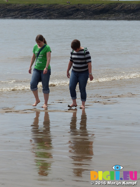 FZ030516 Jenni and Libby walking down Barry beach